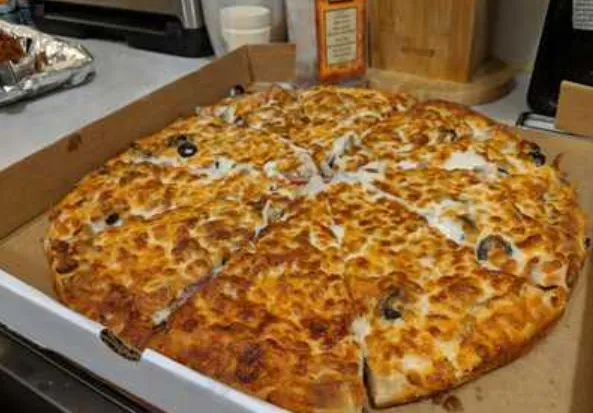 Meat Lover Pizza at Select Pizza Calgary NE