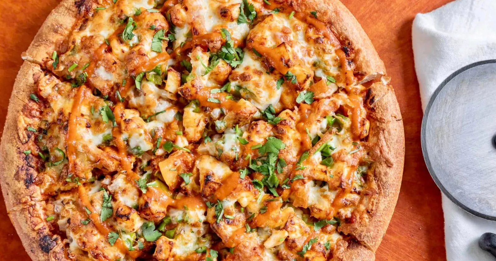 Indian-Punjabi style pizza at Select Pizza Calgary NE